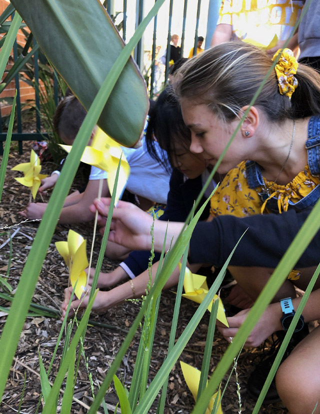 Students in garden at Corpus Christi Catholic Primary School Cranebrook