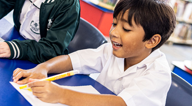 Smiling student from Corpus Christi Catholic Primary School Cranebrook