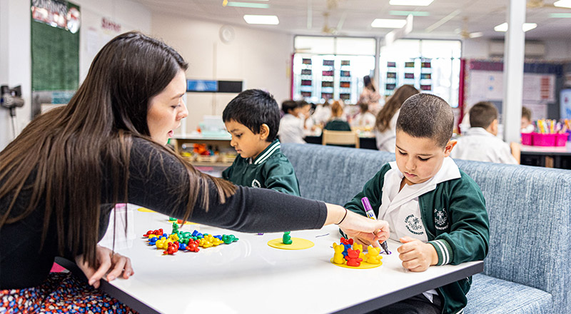 Teacher with students at Corpus Christi Catholic Primary School Cranebrook