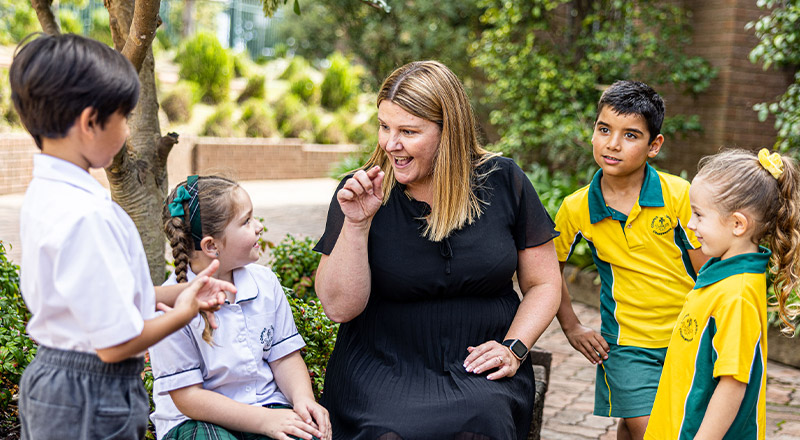 Students and principal Sarah O'Rourke from Corpus Christi Catholic Primary School Cranebrook