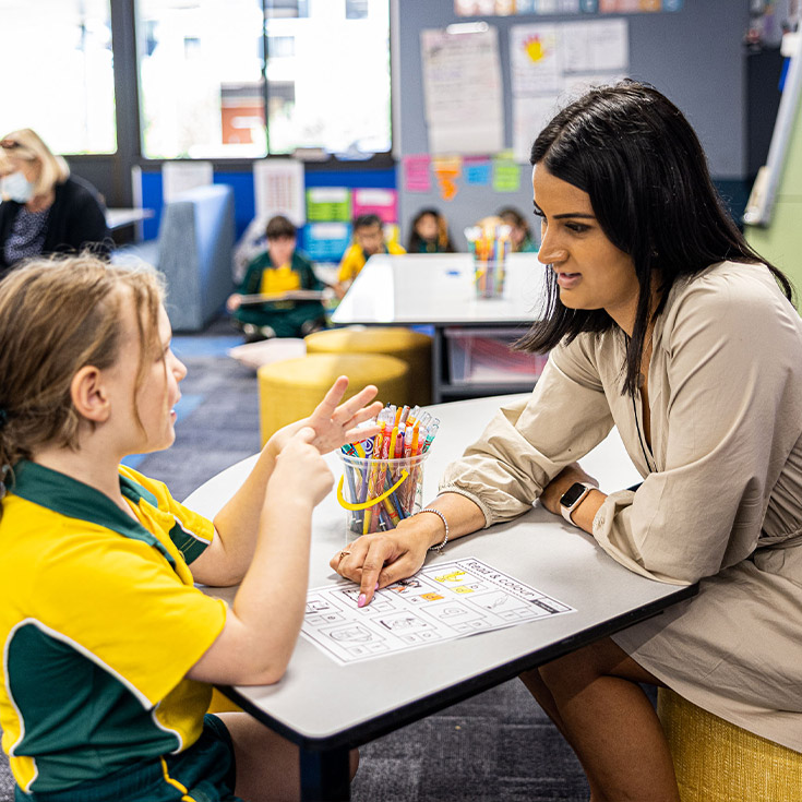 Teacher and student at Corpus Christi Catholic Primary School Cranebrook