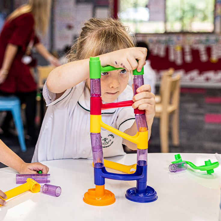 Student playing with equipment at Corpus Christi Catholic Primary School Cranebrook