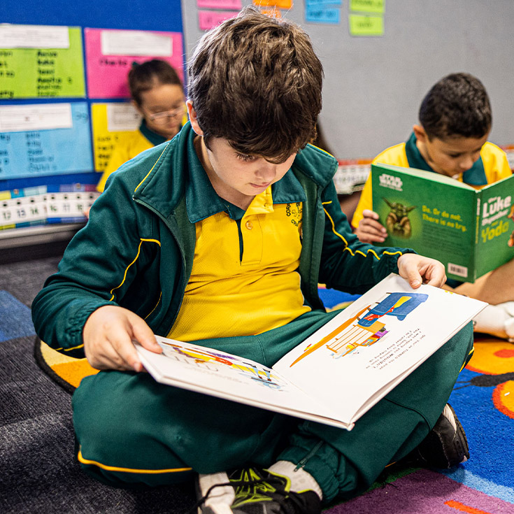 student reading at Corpus Christi Catholic Primary School Cranebrook