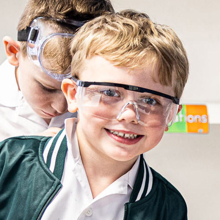Student wearing science goggles at Corpus Christi Catholic Primary School Cranebrook